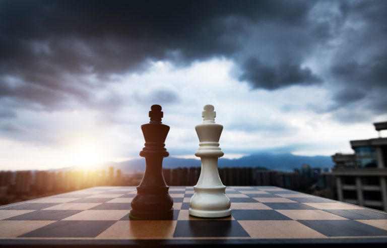 Two chess kings on chess board.